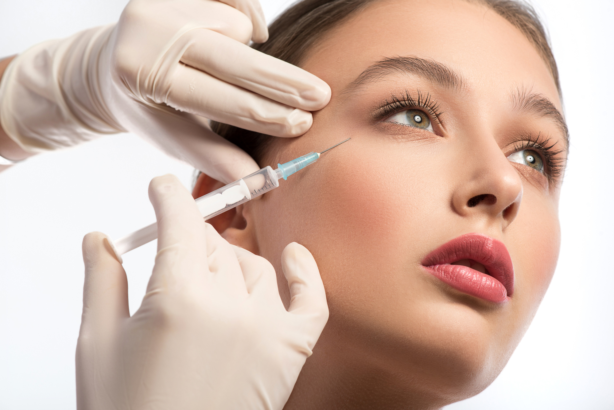 Cute girl receiving hyaluronic acid treatment | Northshore Medical Clinic